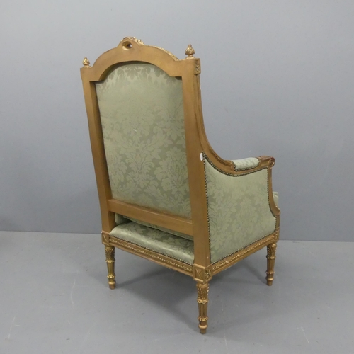 2202 - A French Empire style gilt painted and upholstered throne lounge chair.