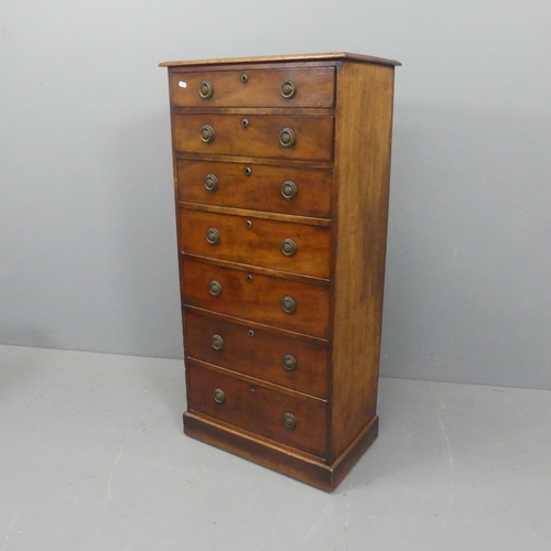 2203 - An antique French mahogany semenier chest of seven drawers. Width 59cm, height 120cm, depth 35cm.