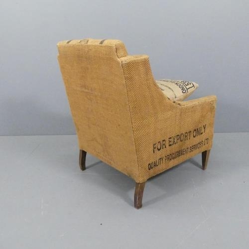 2205 - A 1930s oak parlour chair upholstered in hessian sacks.