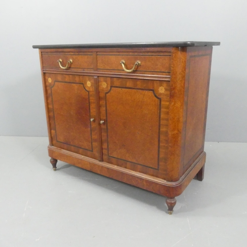 2041 - A French mid 20th century amboyna veneered and ebony strung cabinet with black marble top and brass ... 