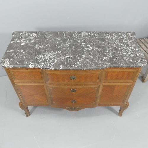 2031 - An antique French oak and kingwood marquetry inlaid Transition style chest of three drawers, with ma... 