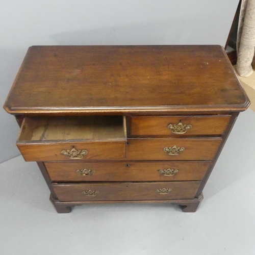 2208 - A Georgian mahogany chest of two short and three long drawers, with ornate brass pulls and bracket f... 