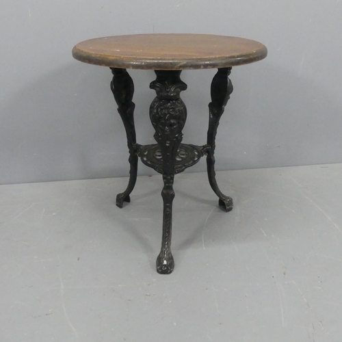 2210 - A circular oak-topped pub table on painted aluminium base. Diameter 60cm, height 70cm.