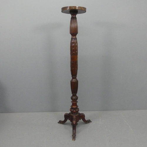 2213 - A 19th century mahogany torchère / plant stand. Height 145cm.