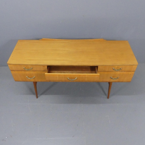 2220 - A mid-century maple veneered sideboard, with six drawers and teak legs, in the manner of Meredew. Wi... 