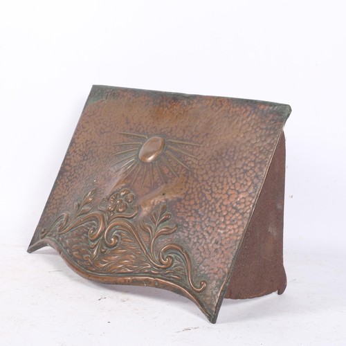 368 - A copper Arts and Crafts style fire mount, decorated with sunrise and floral scene, 30cm x 40cm x 16... 