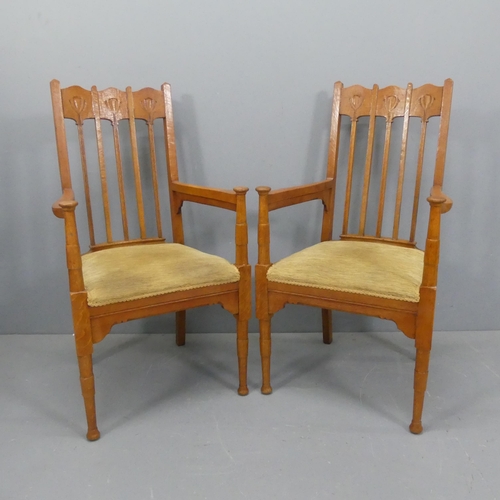 2054 - A pair of Arts and Crafts Glasgow School armchairs in the manner of George Montague Ellwood.