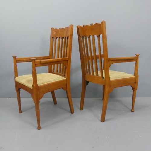 2054 - A pair of Arts and Crafts Glasgow School armchairs in the manner of George Montague Ellwood.