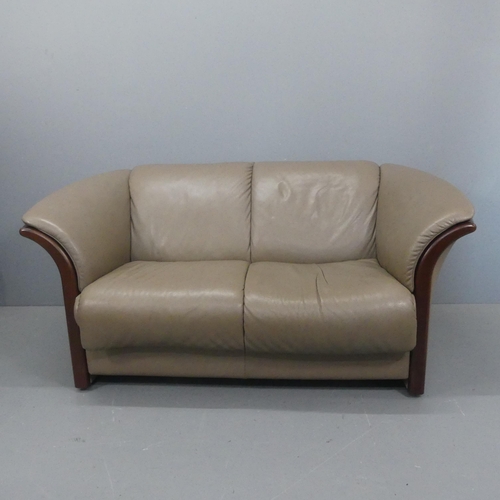 2058 - EKORNES - A contemporary Manhattan Stressless two-seater leather-upholstered sofa. RRP £1800. Overal... 