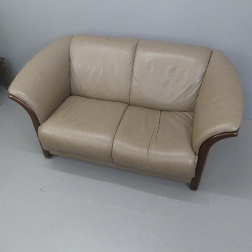 2058 - EKORNES - A contemporary Manhattan Stressless two-seater leather-upholstered sofa. RRP £1800. Overal... 