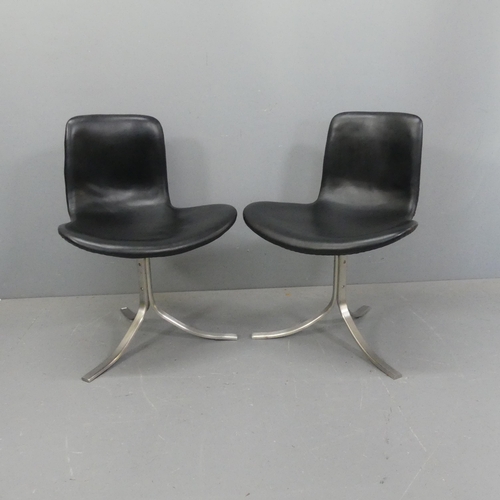 2063 - A pair of mid-century design leather chairs on three curved steel legs in the manner of Poul Kjaerho... 