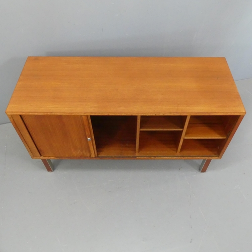 2069 - A mid-century teak sideboard with tambour sliding front, and shelf fitted interior, in the manner of... 