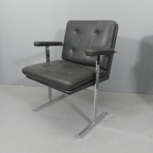 2080 - ROBIN DAY - A mid-century Hille Delphi leather and chrome armchair or desk chair on T shaped legs, w... 