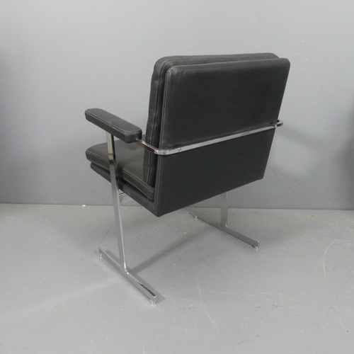 2080 - ROBIN DAY - A mid-century Hille Delphi leather and chrome armchair or desk chair on T shaped legs, w... 