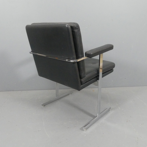 2081 - ROBIN DAY - A mid-century Hille Delphi leather and chrome armchair or desk chair on T shaped legs, w... 