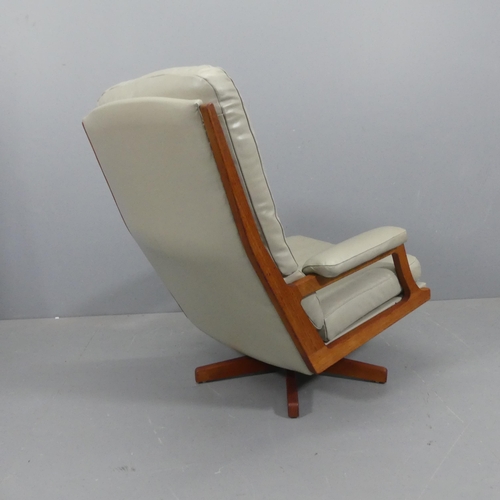 2088 - A mid-century Danish teak and faux-leather upholstered swivel lounge chair.