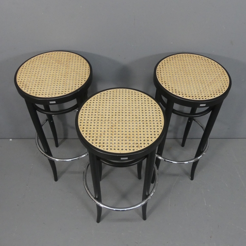 2239 - THONET - A set of 3 contemporary bentwood and chrome stools with cane top and maker’s labels, curren... 