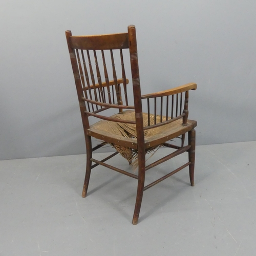 2240 - A 19th century oak Arts & Crafts oak Sussex chair, in the manner of William Birch for Liberty & Co..... 