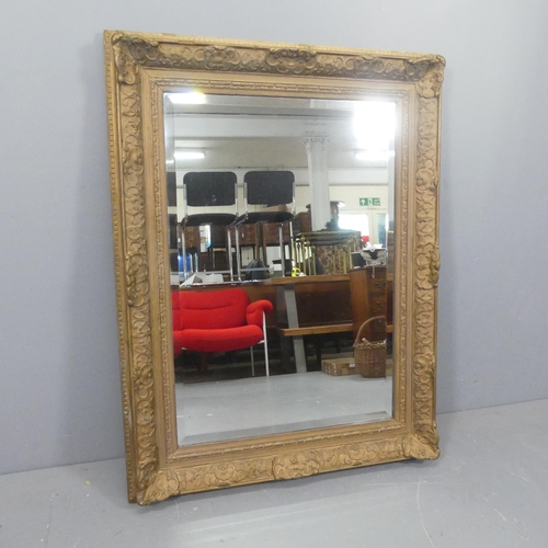 2295 - A 19th century French rectangular gilt gesso framed and bevel edged wall mirror. Width 98cm, height ... 