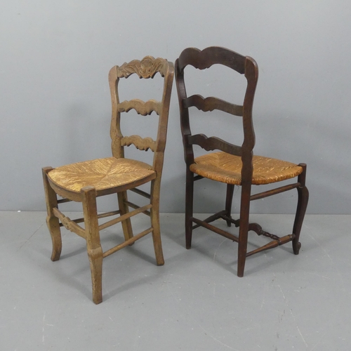 2245 - A matched set of French oak rush-seated ladder-back dining chairs. (4+2).