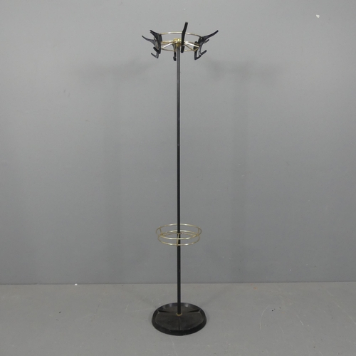 2247 - A mid-century tubular metal hat and coat stand on cast iron base with rotating top. Height 161cm.