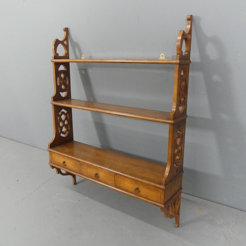 2256 - A 19th century style magoany three tier hanging shelf, with pieced decoration and three drawers. Wid... 