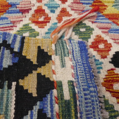 2259 - A Chobi Kilim rug. Length 95cm, width 62cm.