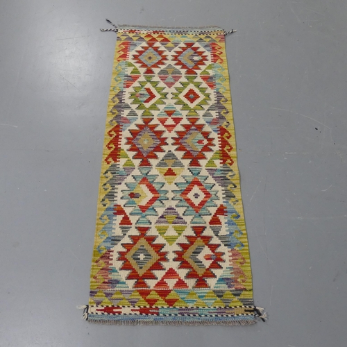 2265 - A Chobi Kilim runner. Length 150cm, width 60cm.