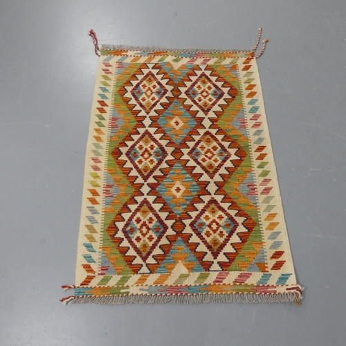 2266 - A Chobi Kilim rug. Length 123cm, width 84cm.