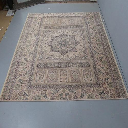 2270 - A cream-ground Persian design carpet. Length 260cm, width 200cm.