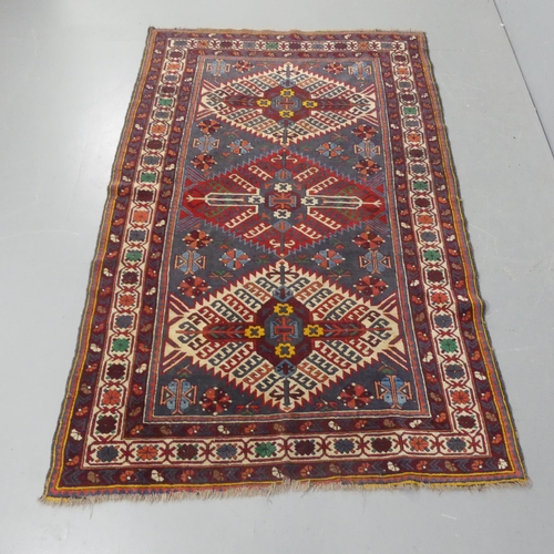 2271 - A red-ground Shirvan rug. Length 205cm, width 130cm.