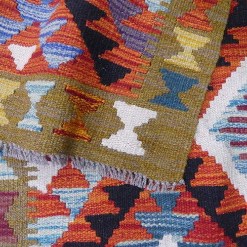 2284 - A Maimana Kilim runner. Length 390cm, width 88cm.