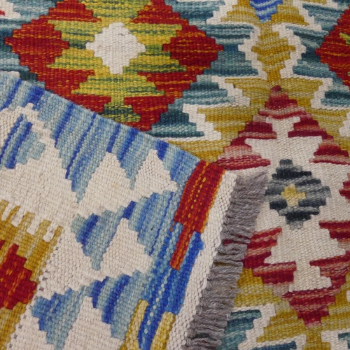 2287 - A Chobi Kilim rug. Length 182cm, width 125cm.