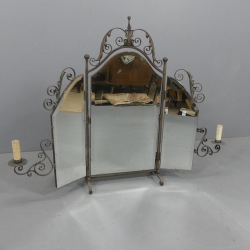 2301 - A French three-fold dressing table mirror in wrought iron frame with two candle sconces. Maximum dim... 