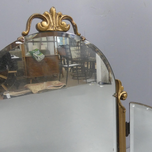 2302 - A French three fold dressing table mirror in carved giltwood frame. Maximum dimensions - width 69cm,... 