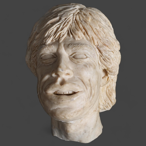 756 - Rolling Stones Interest : A wax sculpture, bust of Mick Jagger, unsigned, height 20cm.