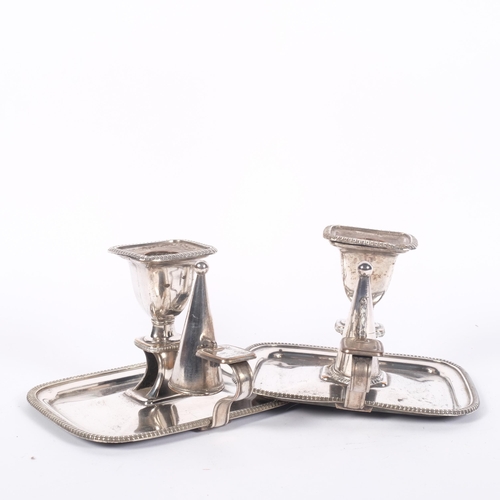 552 - A pair of Sheffield plate chamber sticks and snuffers