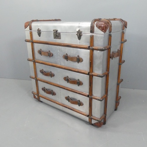 2553 - A contemporary Aviator's chest of three long drawers, with lifting top, with aluminium skin, teak ba... 