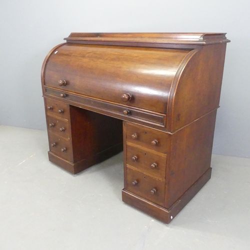 2561 - A 19th century twin-pedestal cylinder-top desk, with fitted interior and six drawers. Overall width ... 