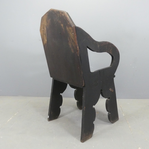 2562 - A 19th century Indian plank chair.