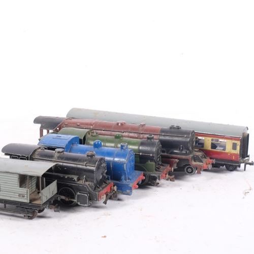 643 - A TIR black locomotive, a Hornby LNER OO gauge green locomotive, a Dinky locomotive, etc