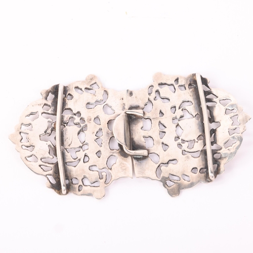 590 - A late Victorian silver nurse's buckle, Saunders & Shepherd, Chester 1897, pierced heart and cherub ... 