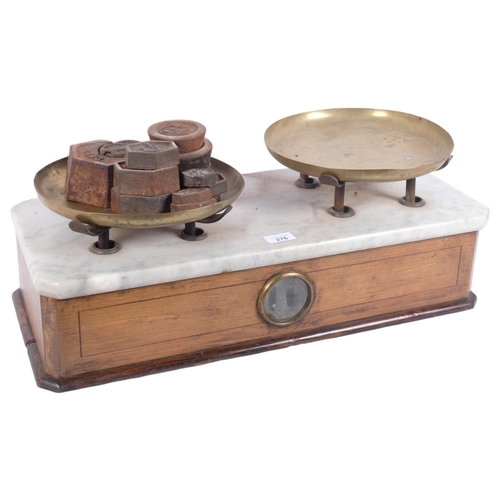 796 - A set of Antique apothecary balance scales, ornate marble top, brass scale dishes, and a selection o... 