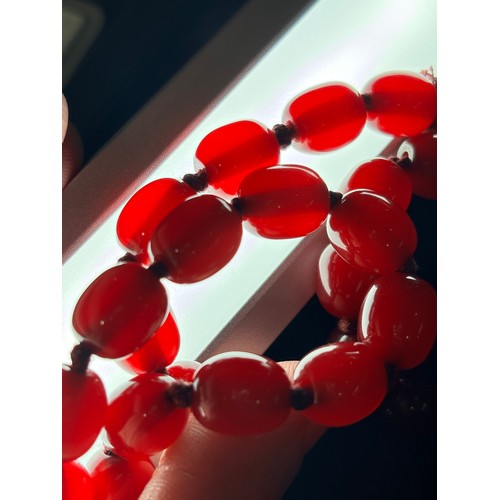 1177 - A Vintage single-strand cherry amber bead necklace, beads measure approx 12.5mm, 70cm, 50.7g