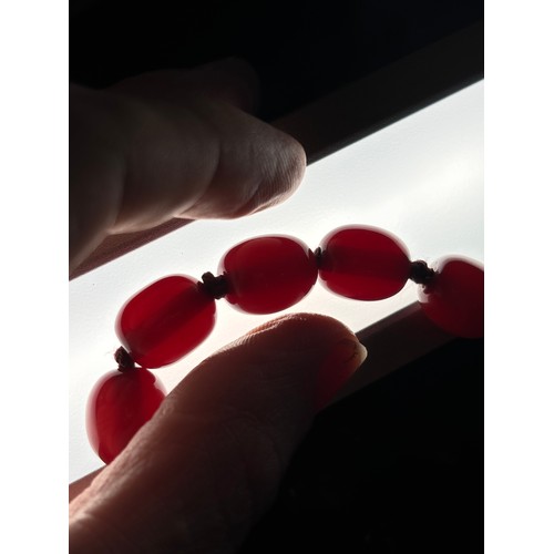 1177 - A Vintage single-strand cherry amber bead necklace, beads measure approx 12.5mm, 70cm, 50.7g