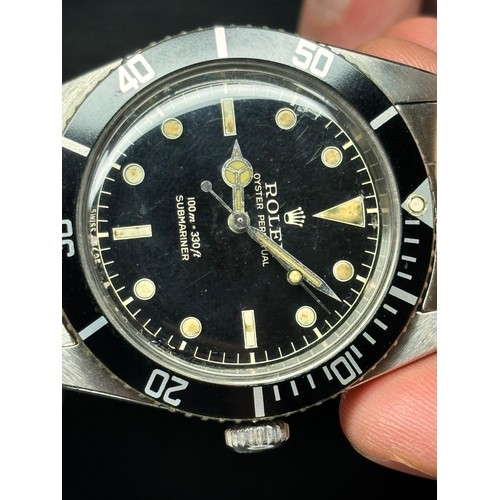 1004 - ROLEX - a Vintage stainless steel Oyster Perpetual Submariner 'James Bond' automatic bracelet watch,... 