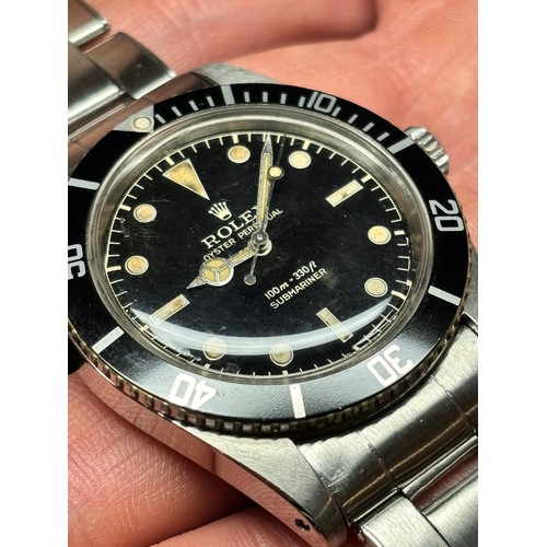 1004 - ROLEX - a Vintage stainless steel Oyster Perpetual Submariner 'James Bond' automatic bracelet watch,... 