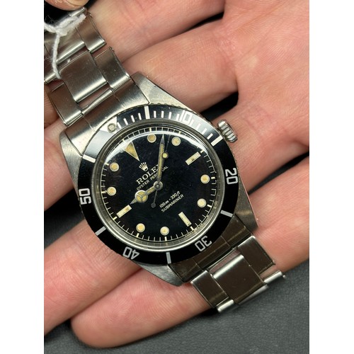 1004 - ROLEX - a Vintage stainless steel Oyster Perpetual Submariner 'James Bond' automatic bracelet watch,... 