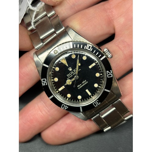 1004 - ROLEX - a Vintage stainless steel Oyster Perpetual Submariner 'James Bond' automatic bracelet watch,... 