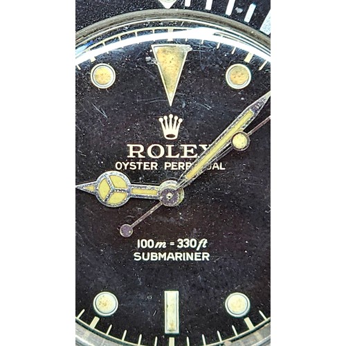 1004 - ROLEX - a Vintage stainless steel Oyster Perpetual Submariner 'James Bond' automatic bracelet watch,... 